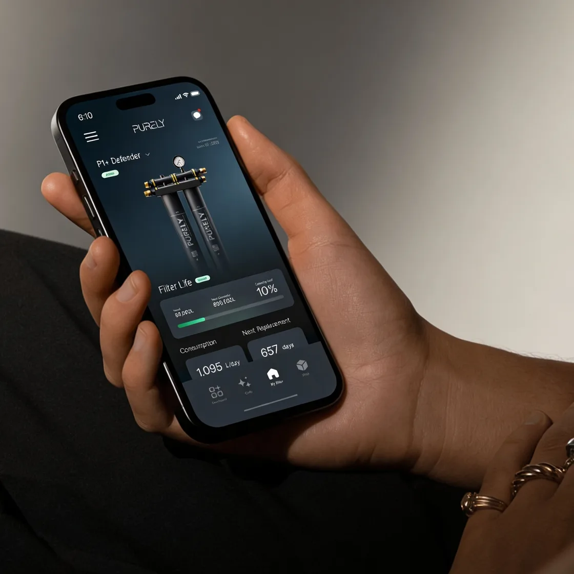 A hand holding a phone running the Purely app